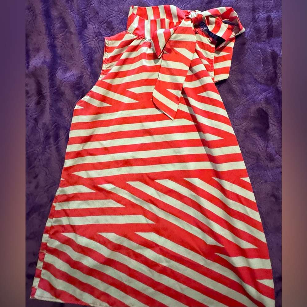 Buttons sleeveless women’s shirt. Appropriate size S